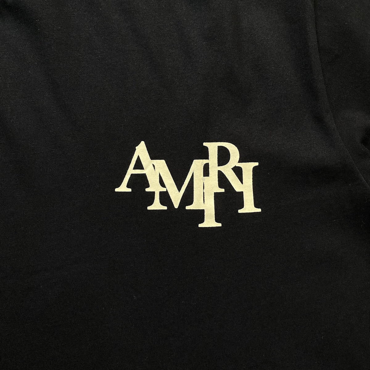 Remera Amiri Champagne Cristal Negra