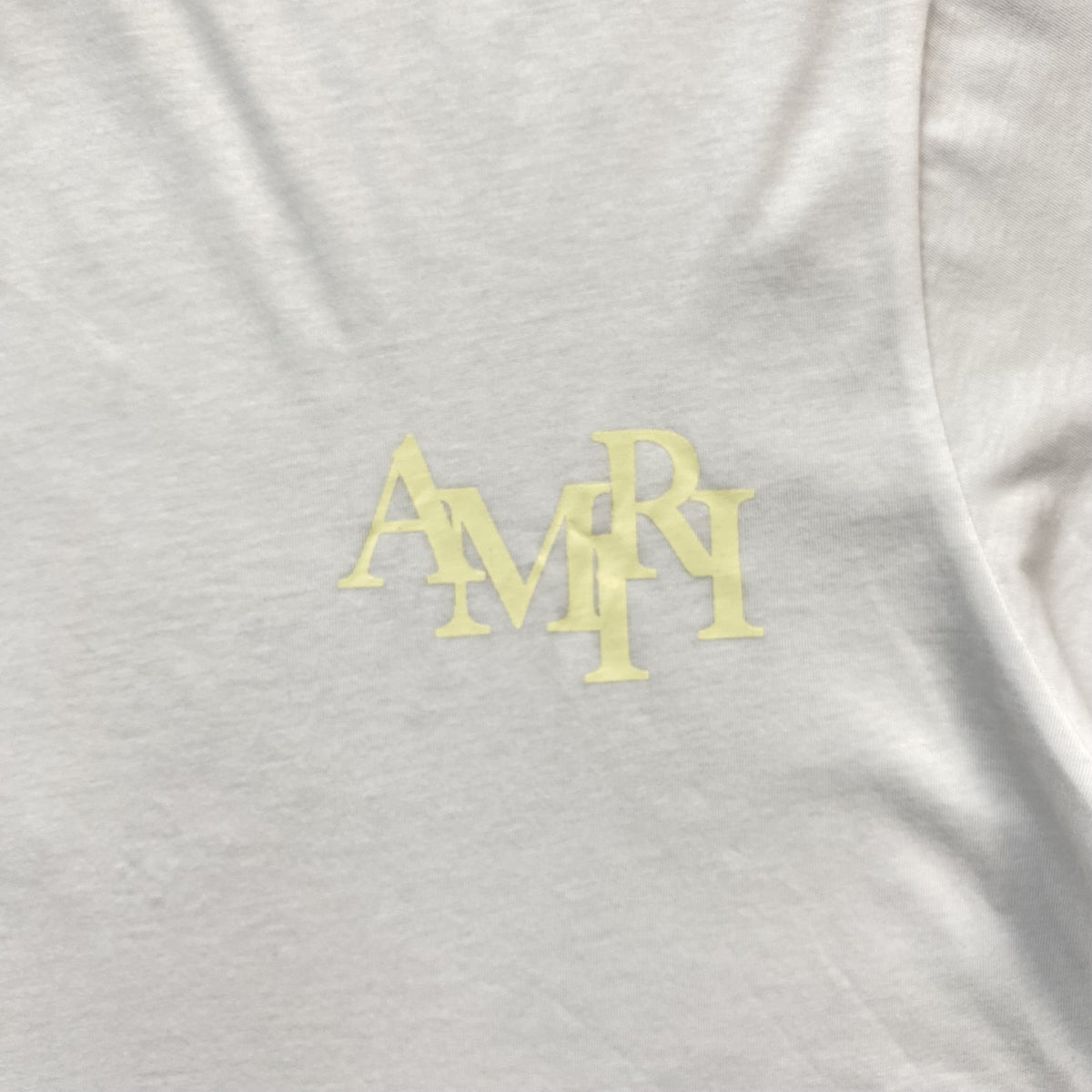 Remera Amiri Champagne Cristal Blanca