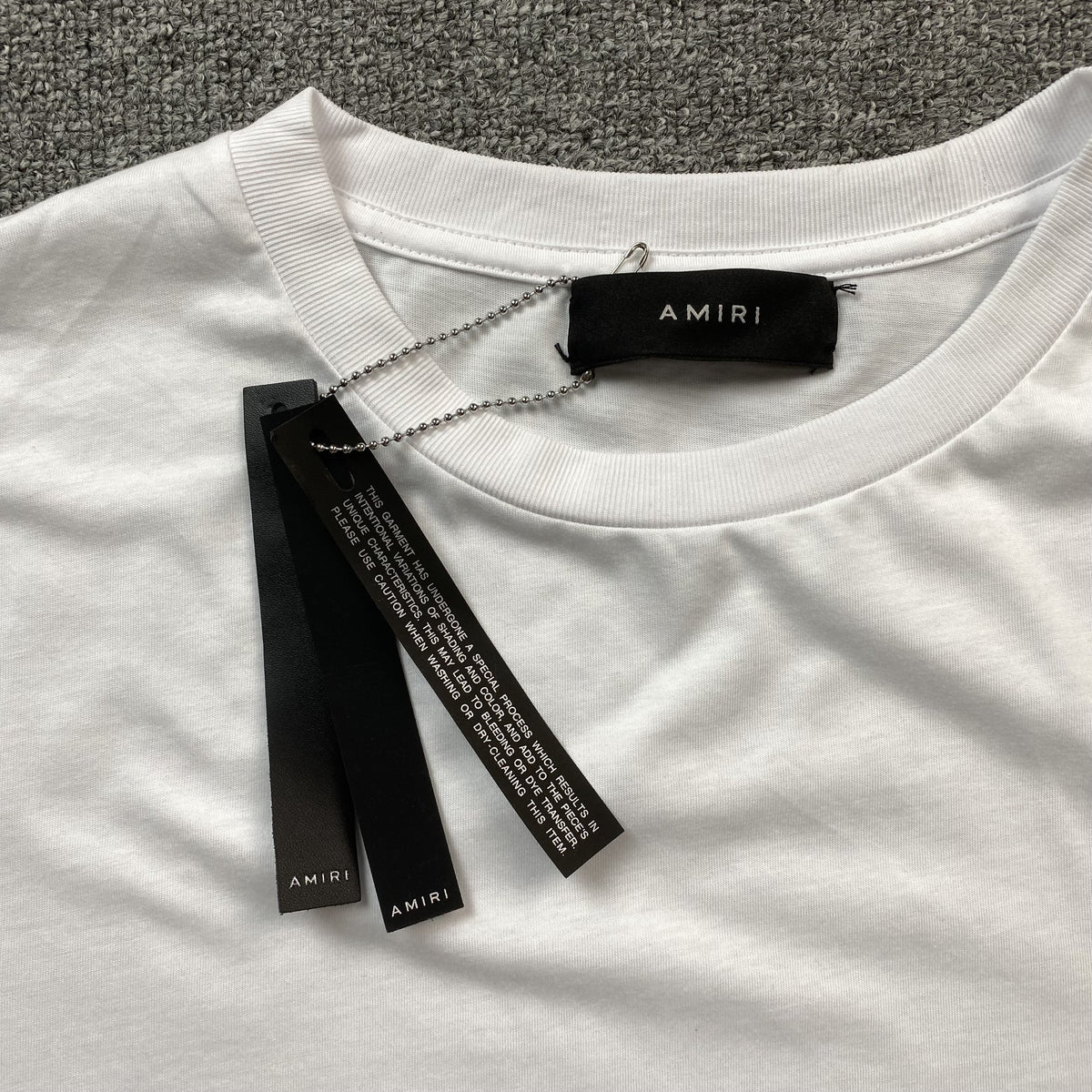 Remera Amiri Champagne Cristal Blanca