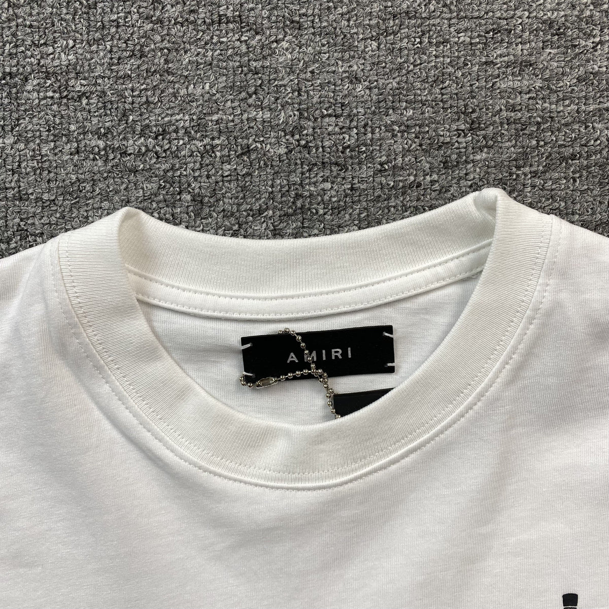 Remera Amiri Dagger Blanca