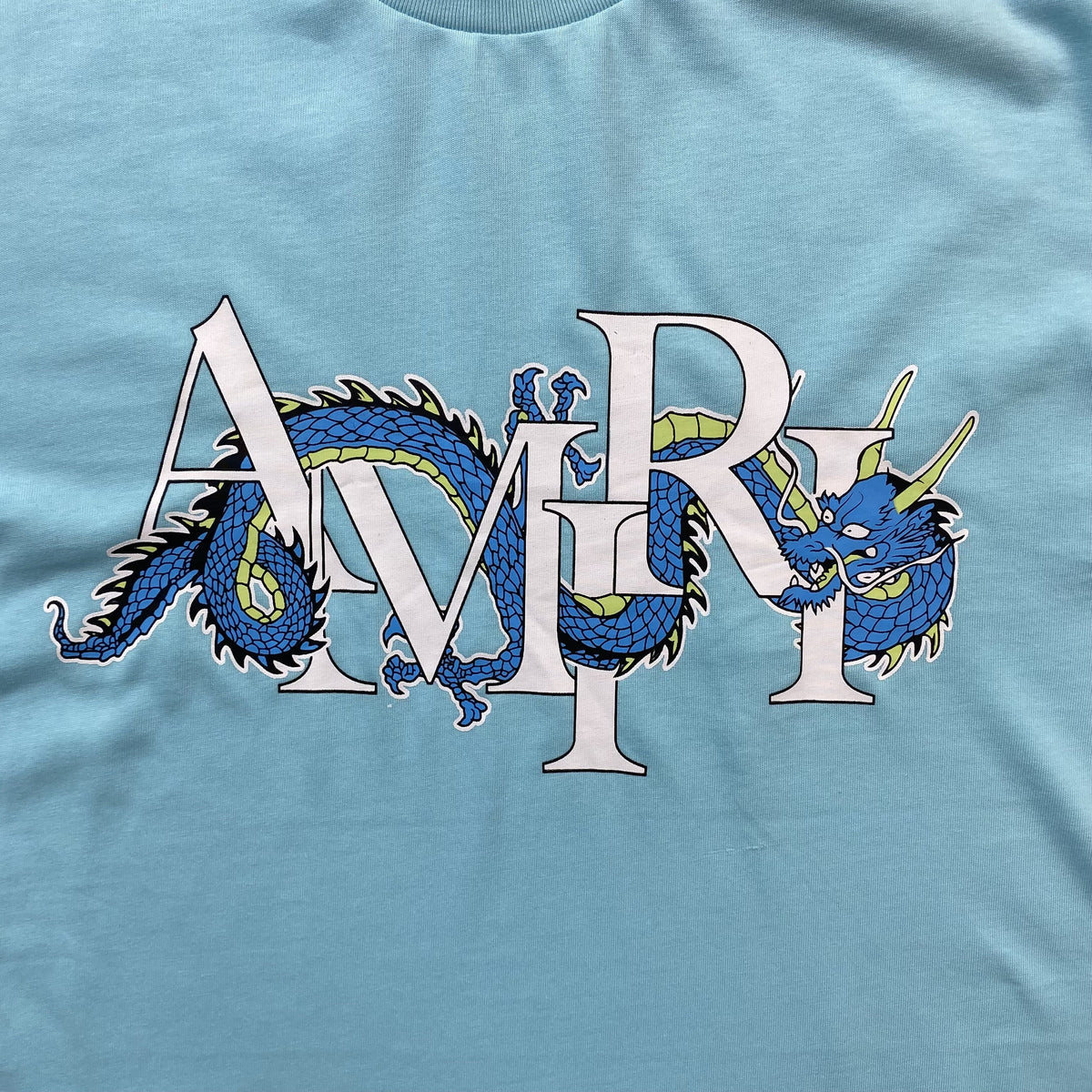 Remera Amiri Dragon Azul Celeste