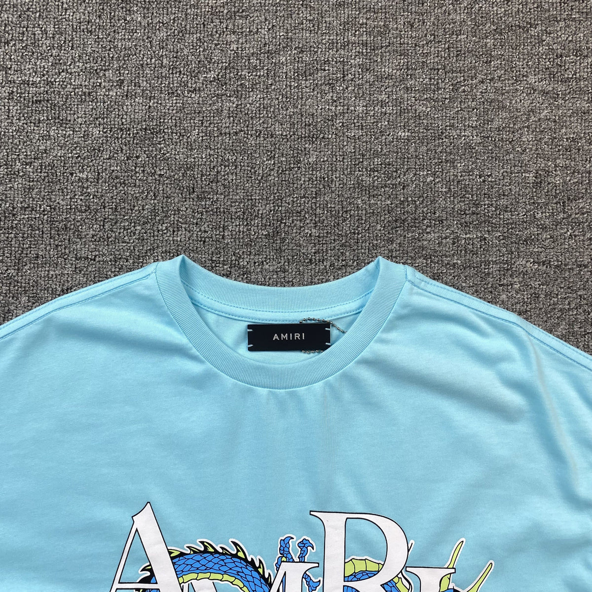Remera Amiri Dragon Azul Celeste