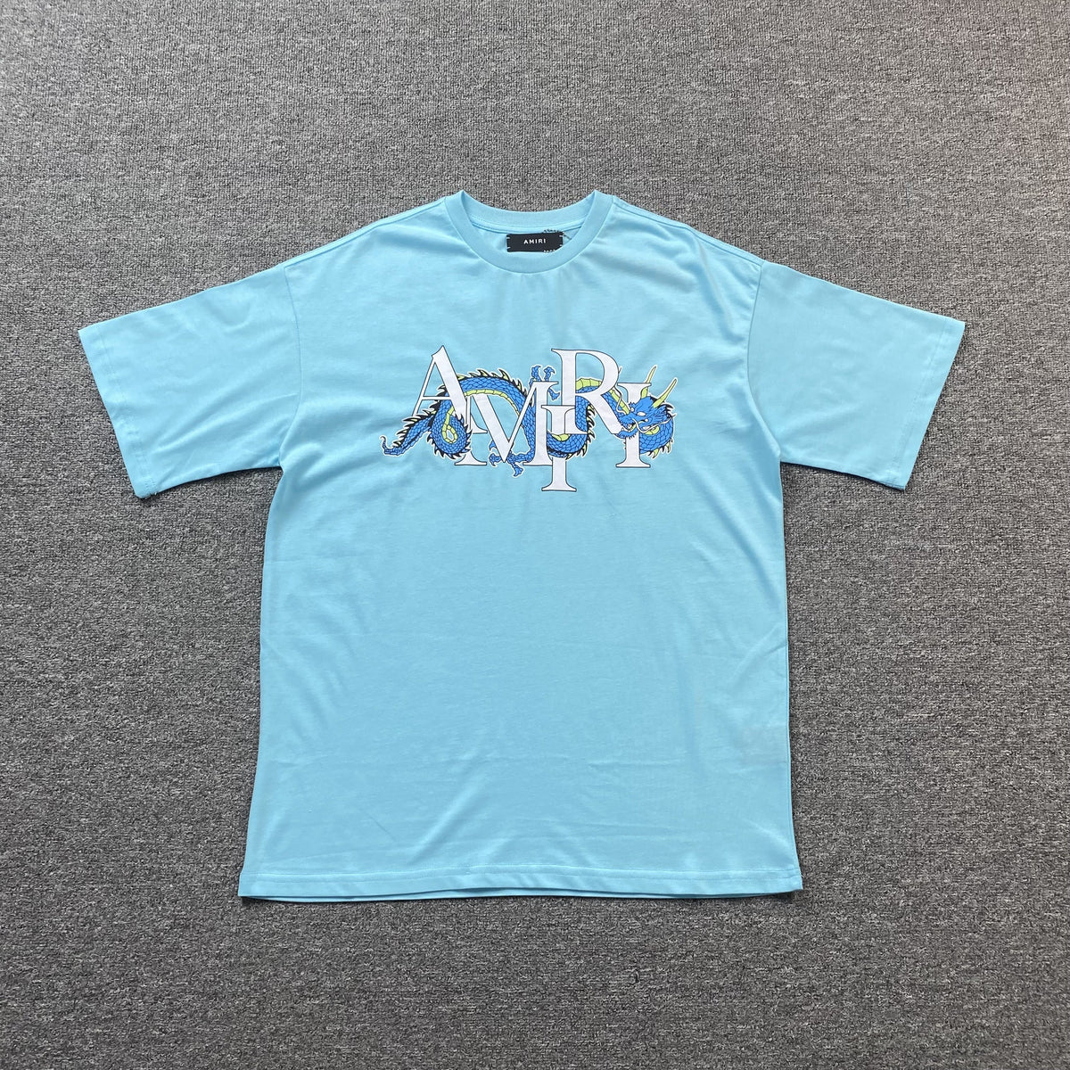 Remera Amiri Dragon Azul Celeste