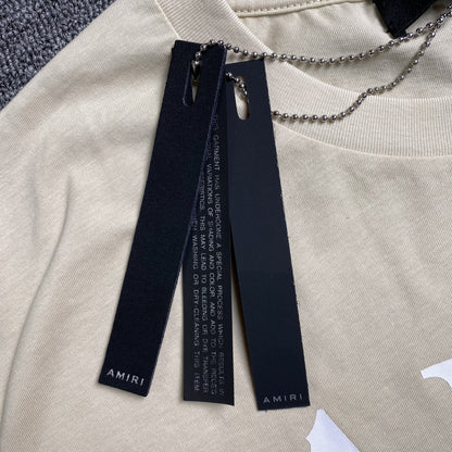 Remera Amiri Ma Bar Logo Beige