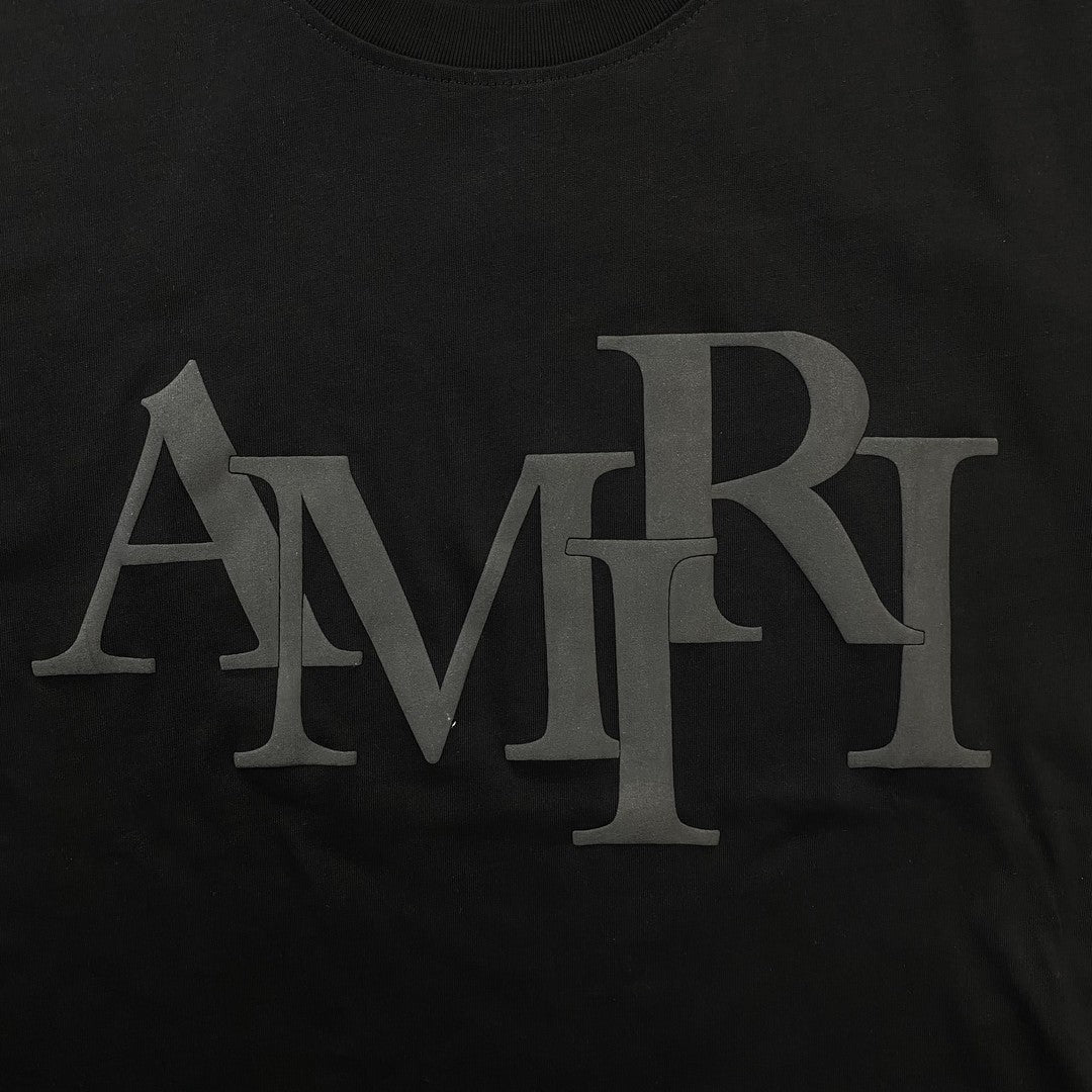 Remera Amiri Staggered Logo Negra