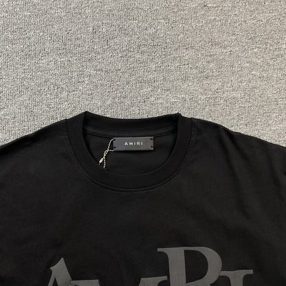 Remera Amiri Staggered Logo Negra