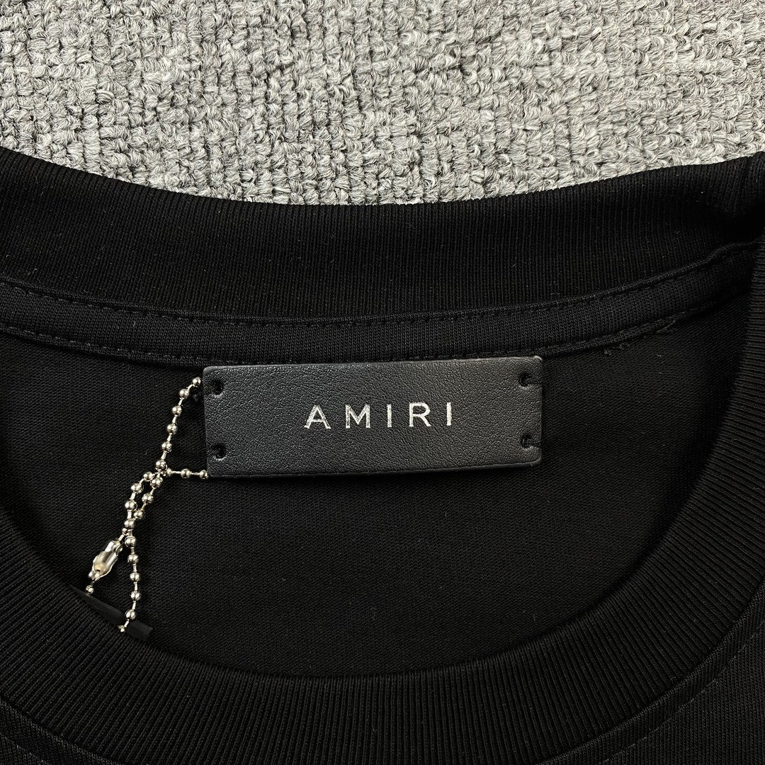 Remera Amiri Staggered Logo Negra