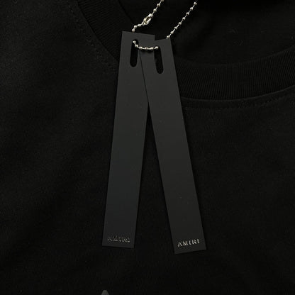 Remera Amiri Staggered Logo Negra