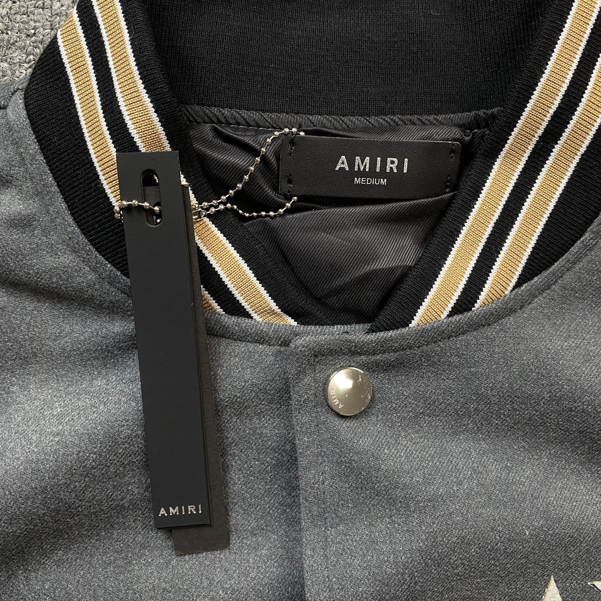 Campera Amiri Stars Bomber Gris