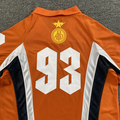 Remera Bape Multi Logo Soccer Jersey Naranja