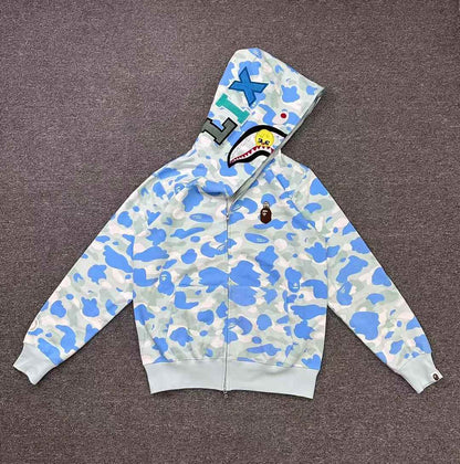 Campera Bape x Stray Kids Felix Shark Celeste