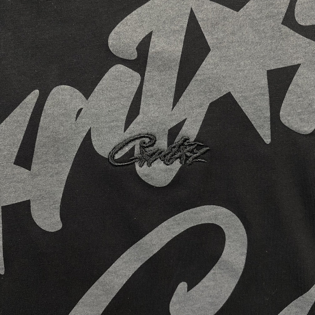 Remera Corteiz Allstarz Allover Negra