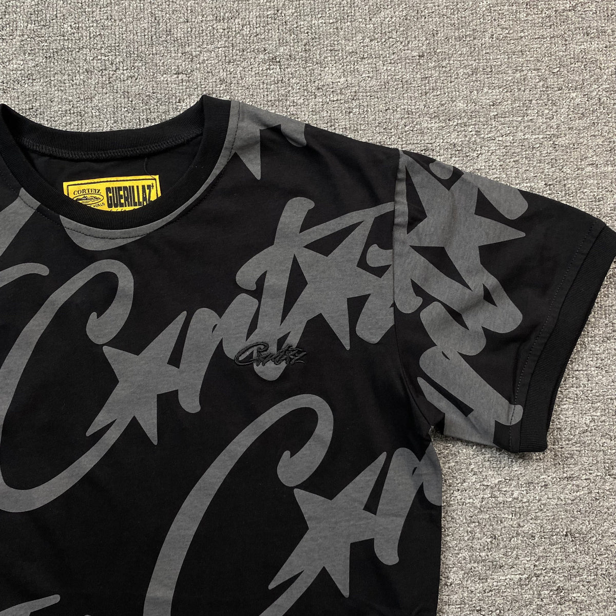 Remera Corteiz Allstarz Allover Negra