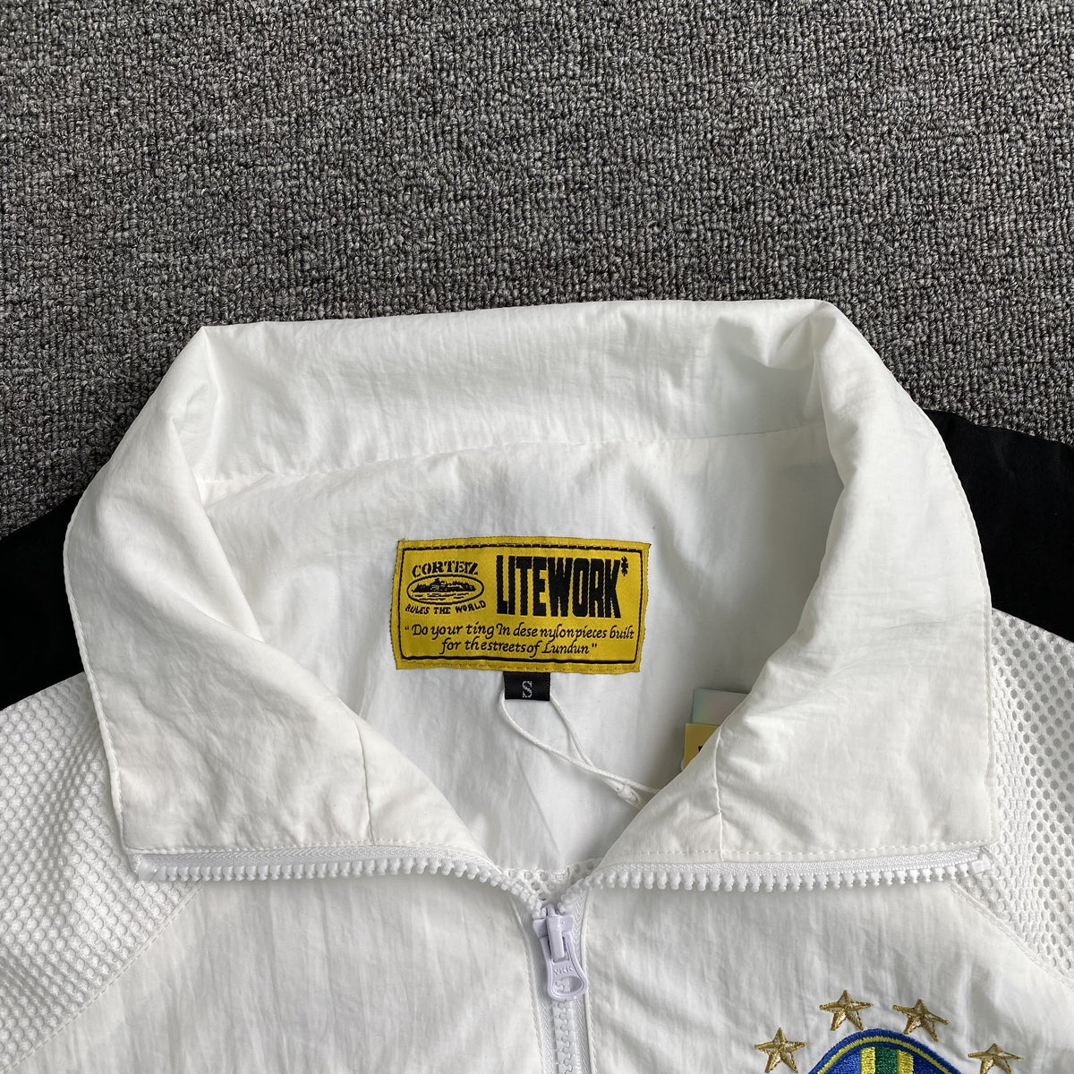 Campera Corteiz Brasil Olympic Shuku Blanca