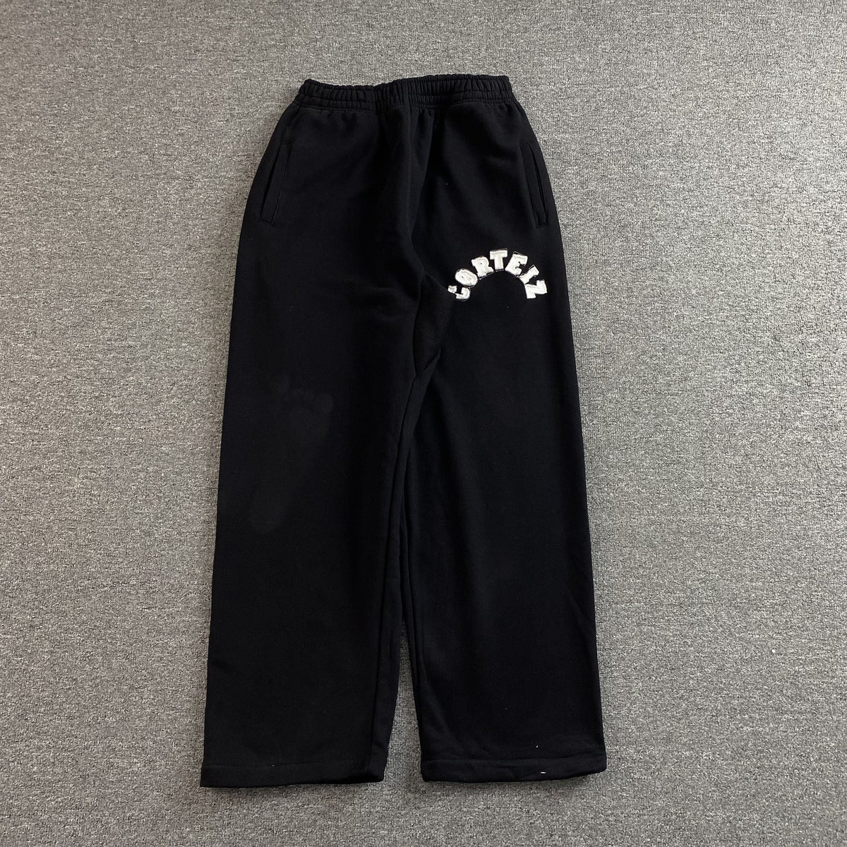 Pantalon Corteiz Colly Arch Open Hem Negro