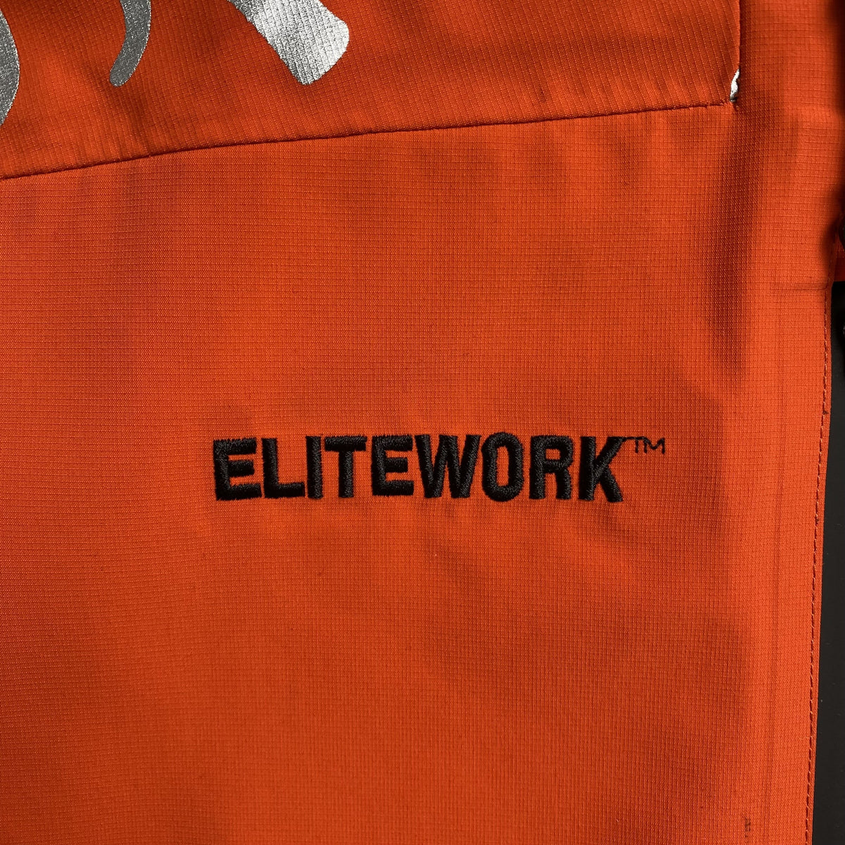 Campera Corteiz Elitework Waterproof Shell Naranja