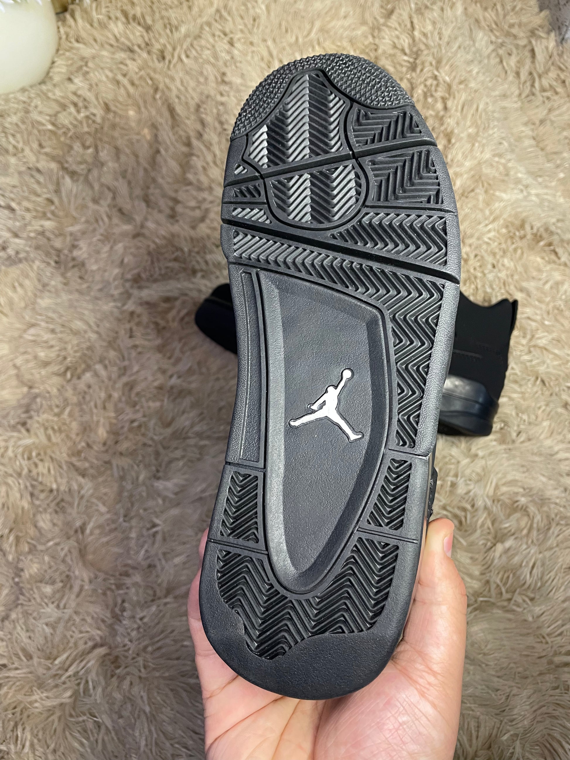 Air Jordan 4 Black Cat suela