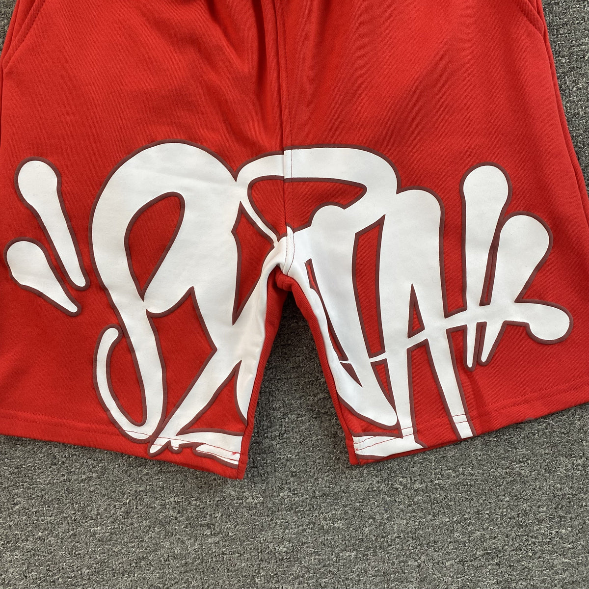 Shorts Syna World Syna Logo Rojo