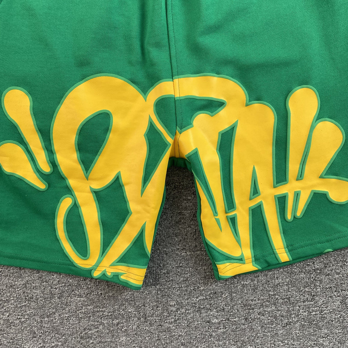 Conjunto Syna World Syna Logo Verde