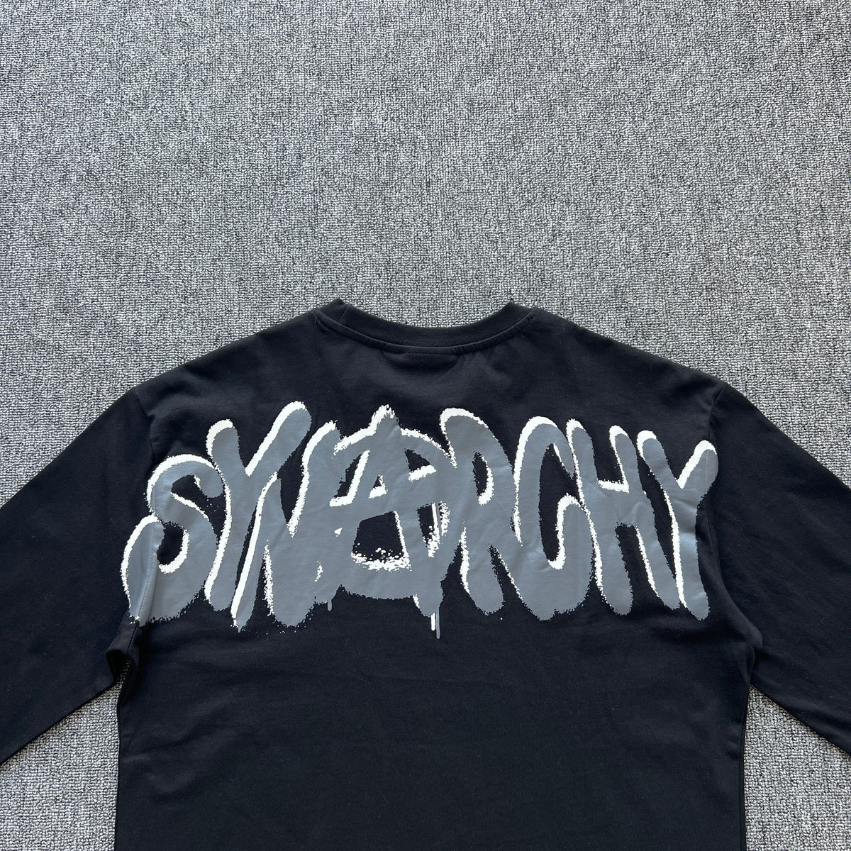 Remera Syna World Synarchy Negra