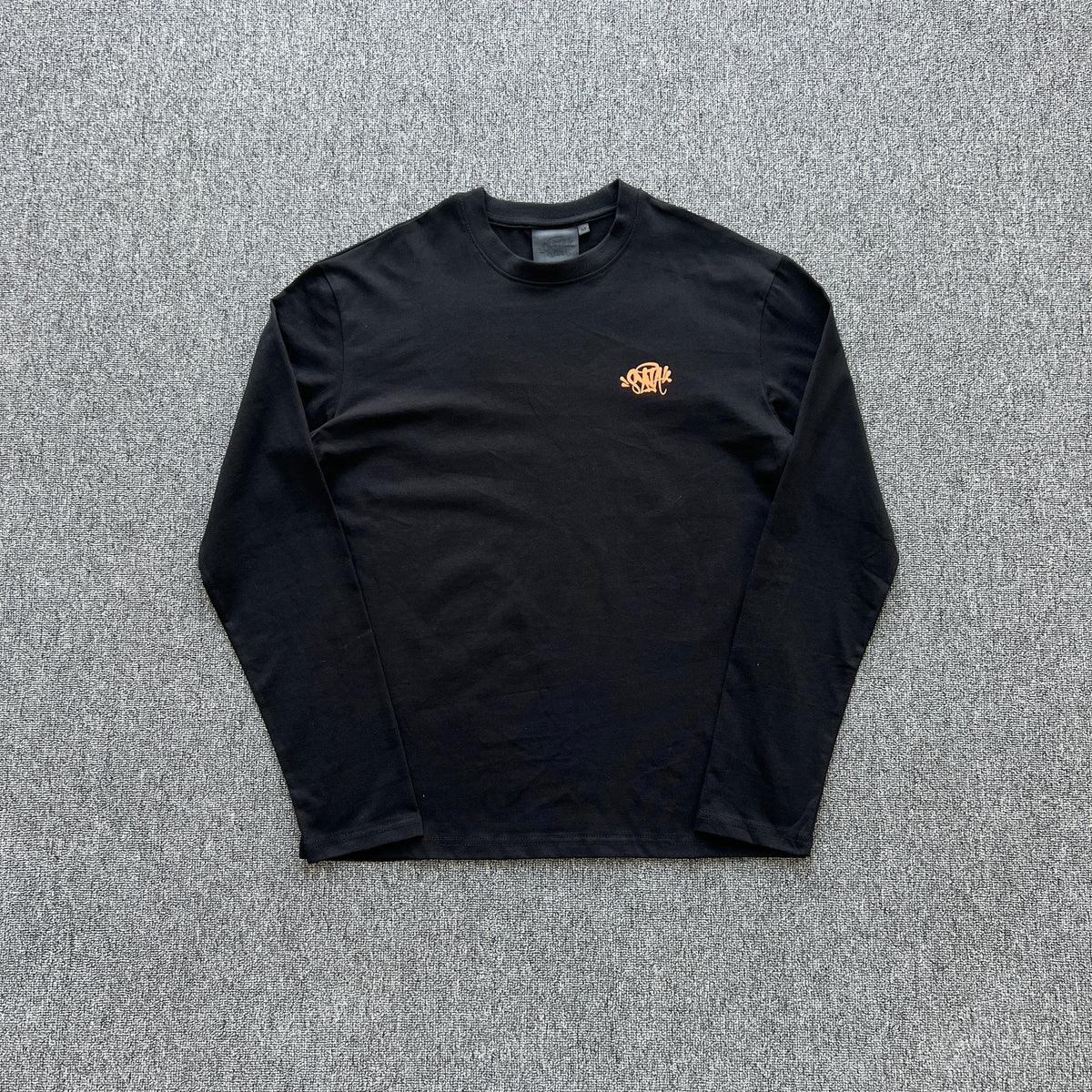 Remera Syna World Synarchy Negra Naranja