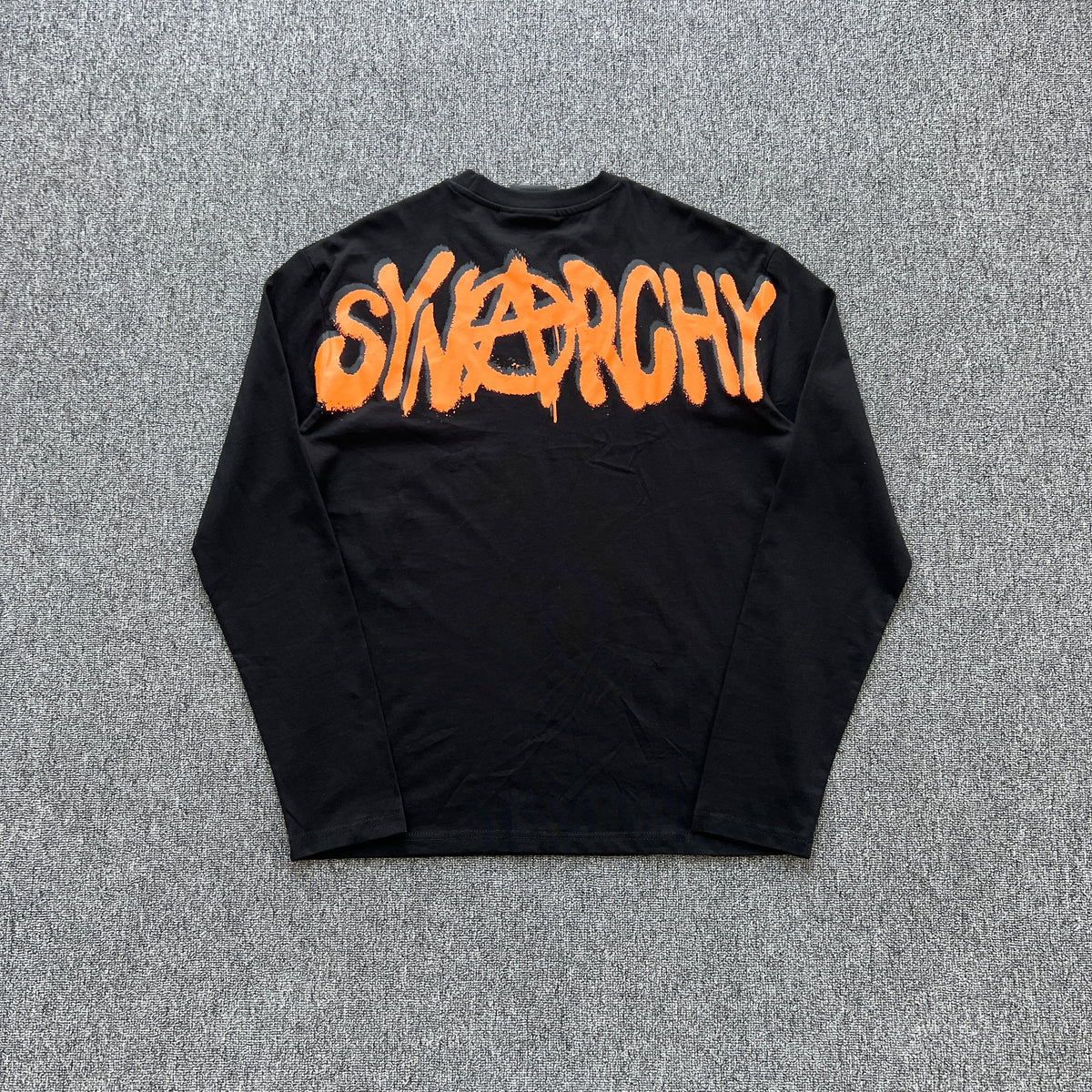 Remera Syna World Synarchy Negra Naranja