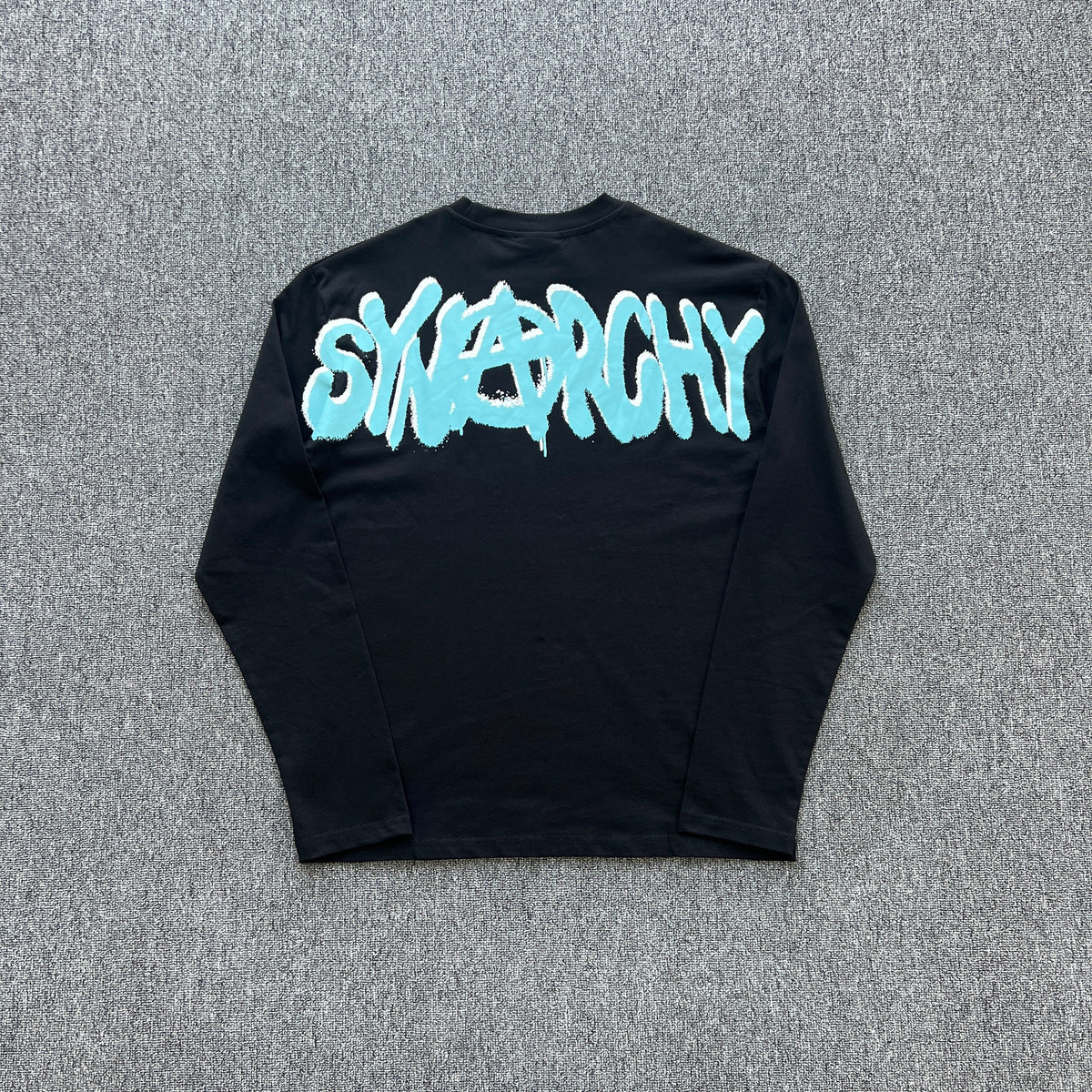 Remera Syna World Synarchy Negra Celeste
