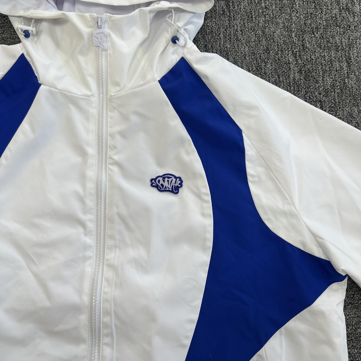 Campera Syna World Vortex Blanca