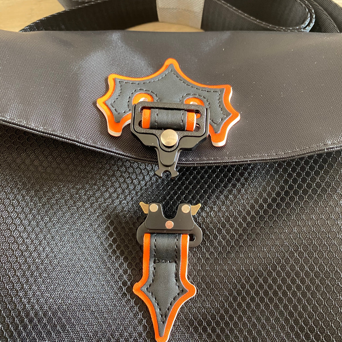 Morral Trapstar Irongate T Crossbody Negro Naranja