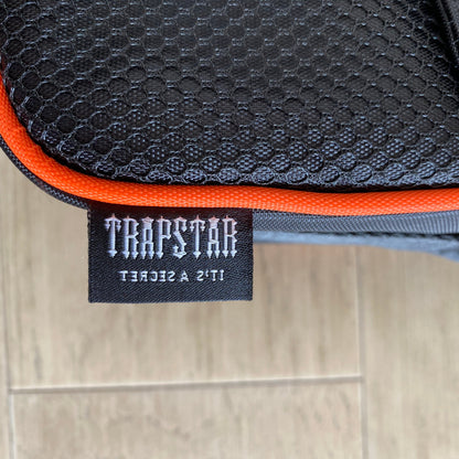Morral Trapstar Irongate T Crossbody Negro Naranja