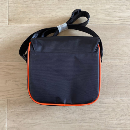 Morral Trapstar Irongate T Crossbody Negro Naranja