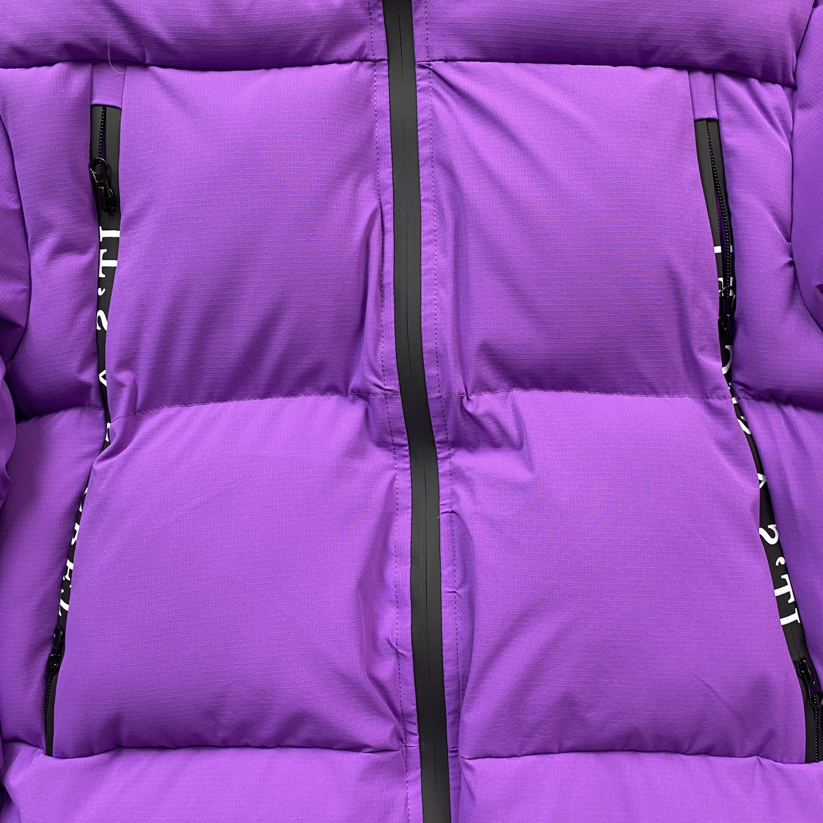Campera Trapstar X Awful Lot Of Cough Syrup Puffer Violeta
